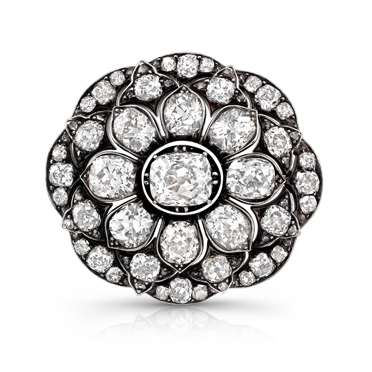 A diamond and black gold flower ring