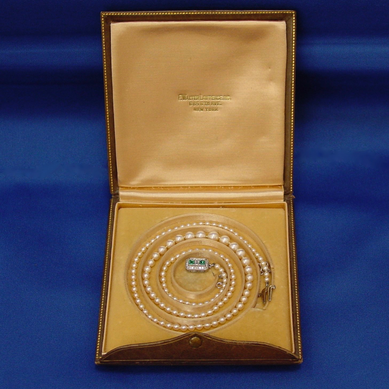 A box with a necklace in it