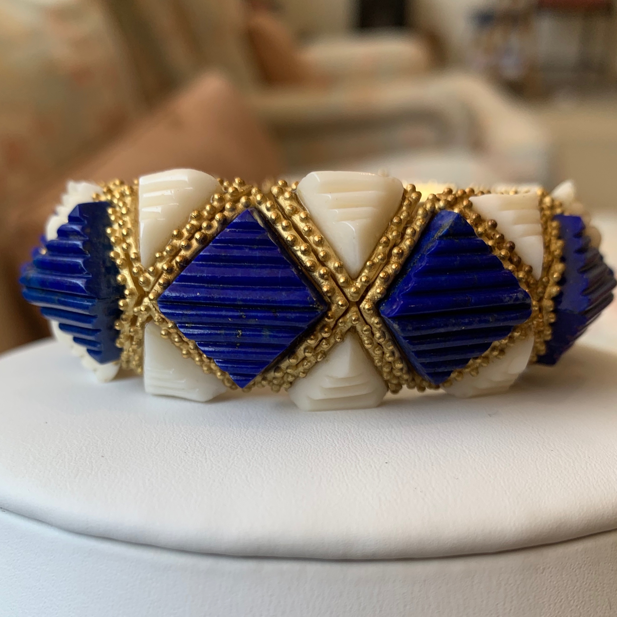 A close up of a bracelet on top of a table