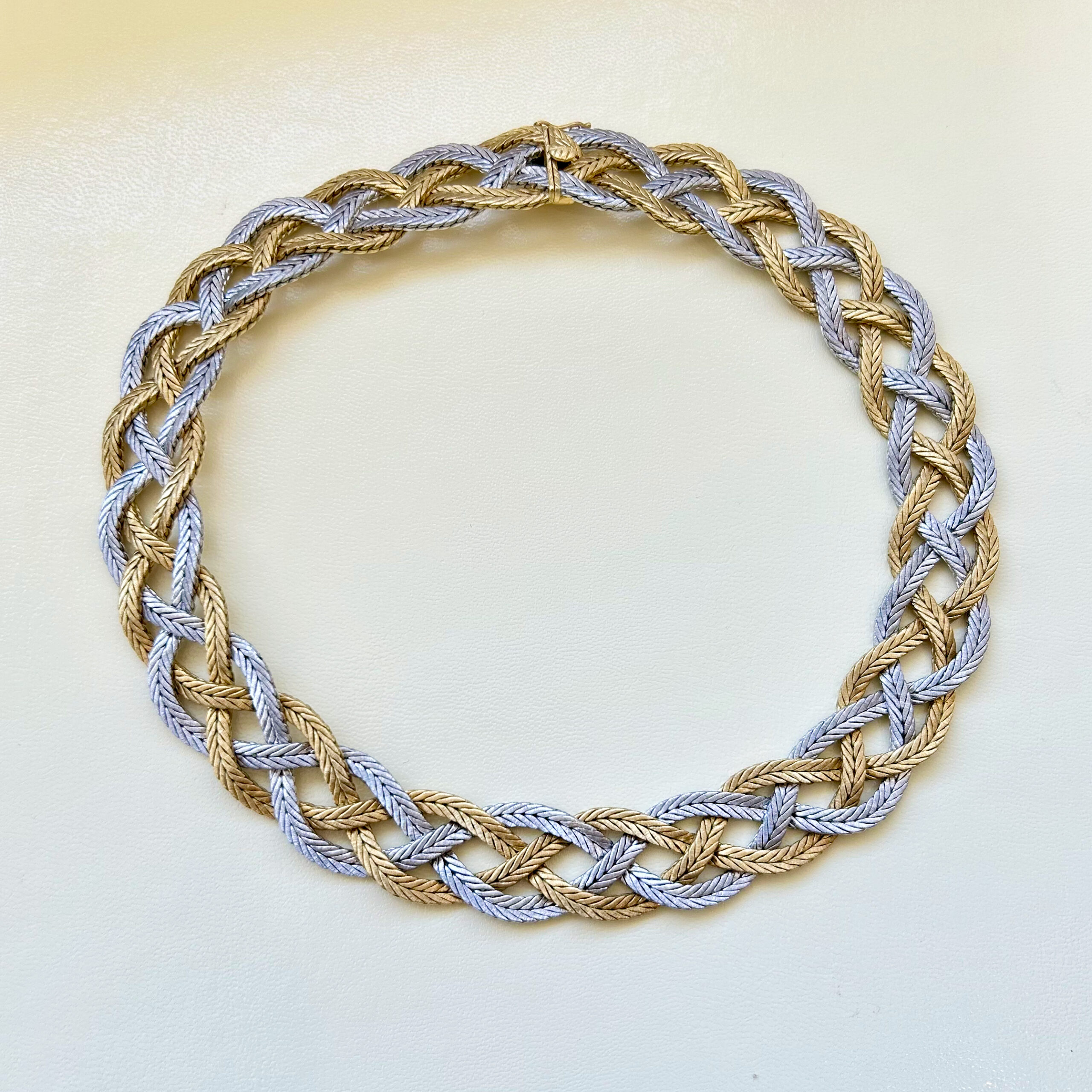 A necklace made of rope and leather.