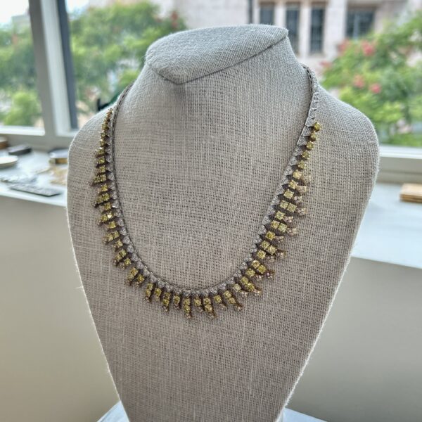 An 18 Karat Gold Fancy Yellow and White Diamond Fringe Necklace