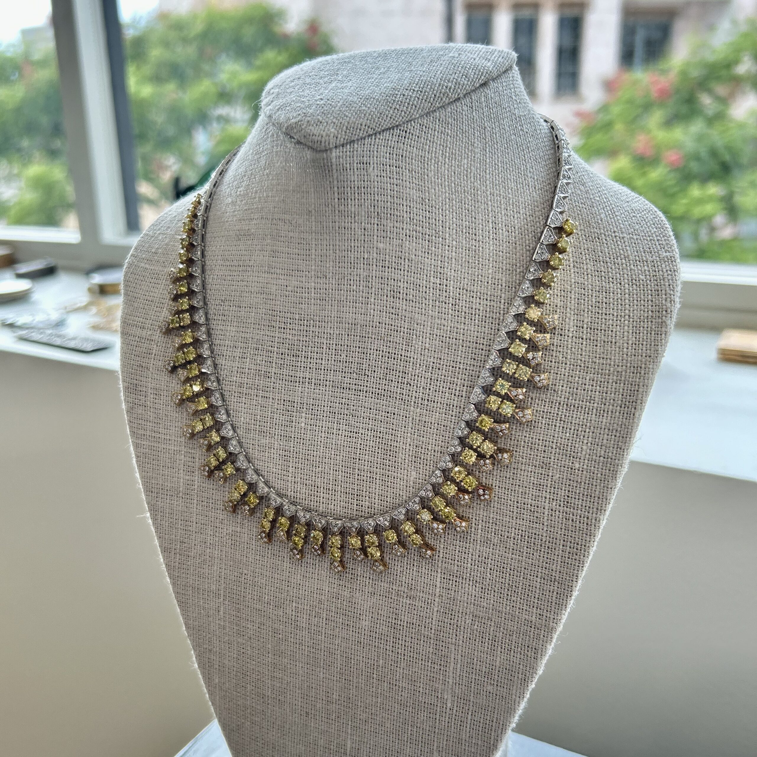 An 18 Karat Gold Fancy Yellow and White Diamond Fringe Necklace