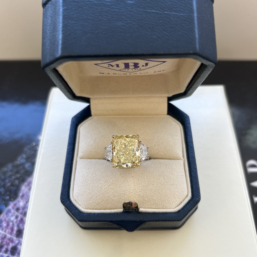 A Fancy Intense Yellow Diamond Ring