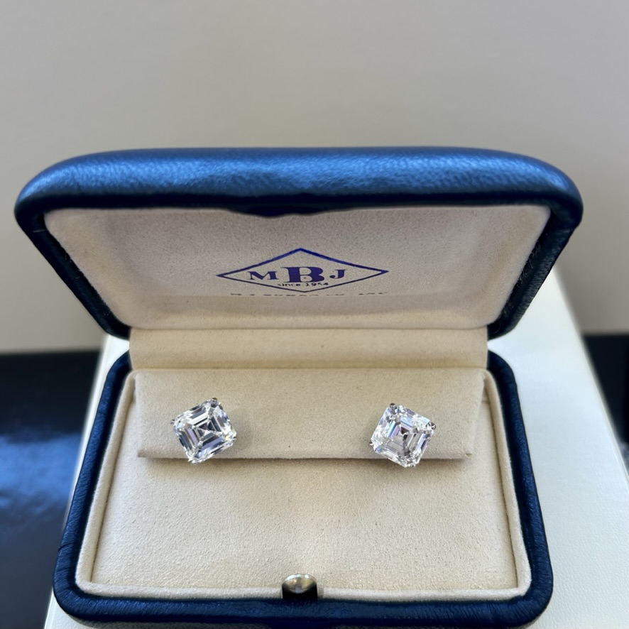 A Pair of Platinum and Asscher Cut Diamond Earrings